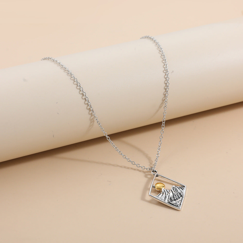 Openwork Sun Mountains Diamond-Shaped Pendant Necklace