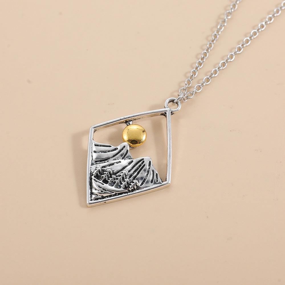 Openwork Sun Mountains Diamond-Shaped Pendant Necklace